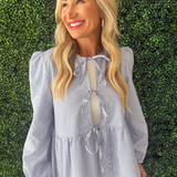 Long Sleeve Tie Front Peplum Blouse