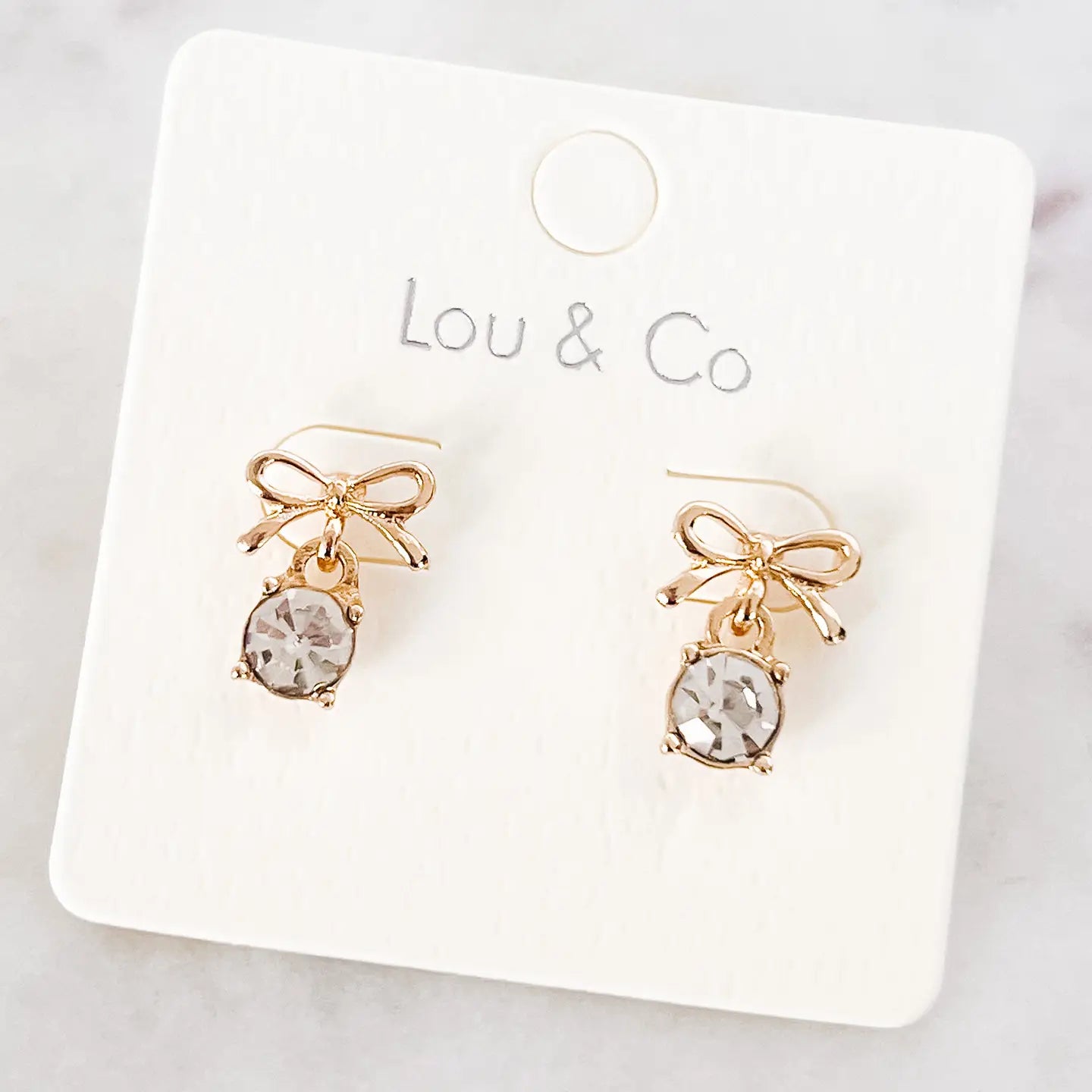 Metal Bow Earrings with Glass Stone Dangle